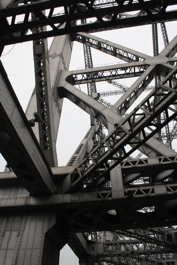 Riveted steel bridge framework seen from below